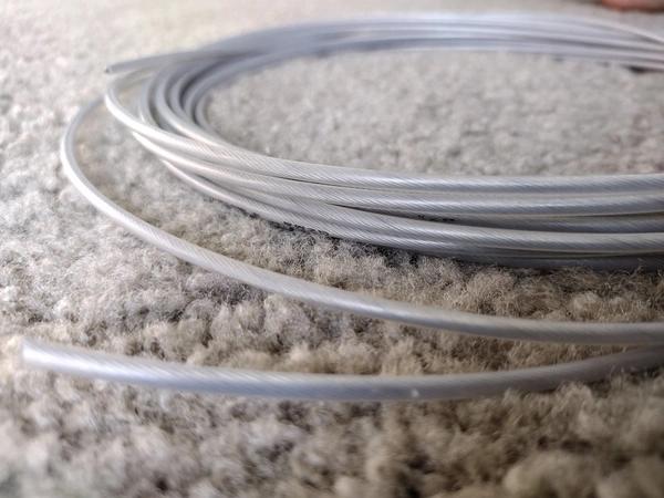Close-up detail of SS316 stainless steel wire used in premium invisible grill systems.